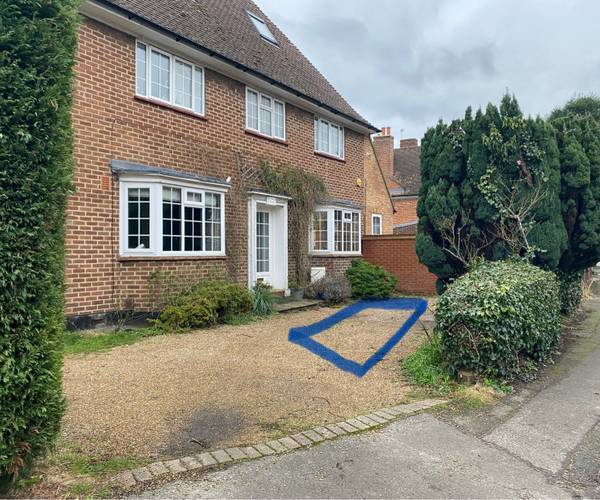 Parking on Woodcote Road, KT18