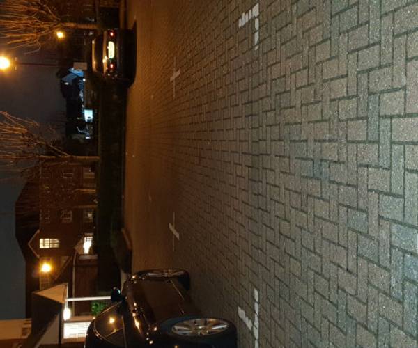 Parking on Sigrist Square, KT2
