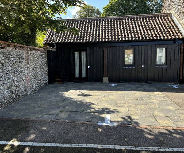 3 M wide parking Bays in Central Holt with CCTV coverage